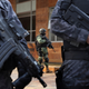 Police stand guard outside a building in Mexico City where authorities arrested an alleged Sinaloa cartel leader in 2017.